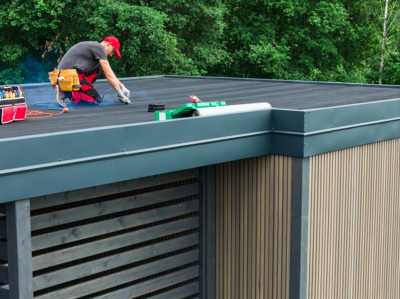 Flat Roof Repair After Storm Or Wind Damage